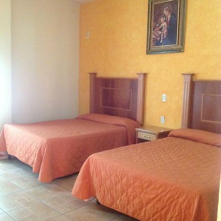 Hotel Genoves San Juan de los Lagos Quarto foto