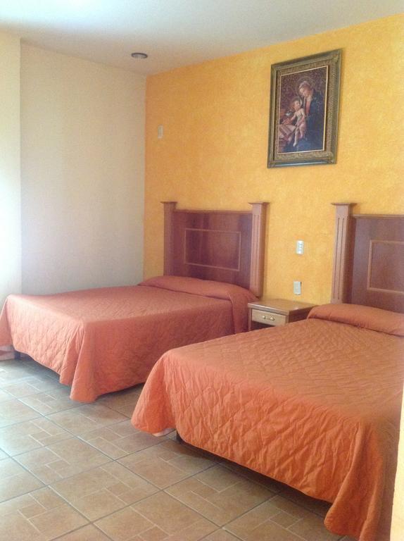 Hotel Genoves San Juan de los Lagos Quarto foto